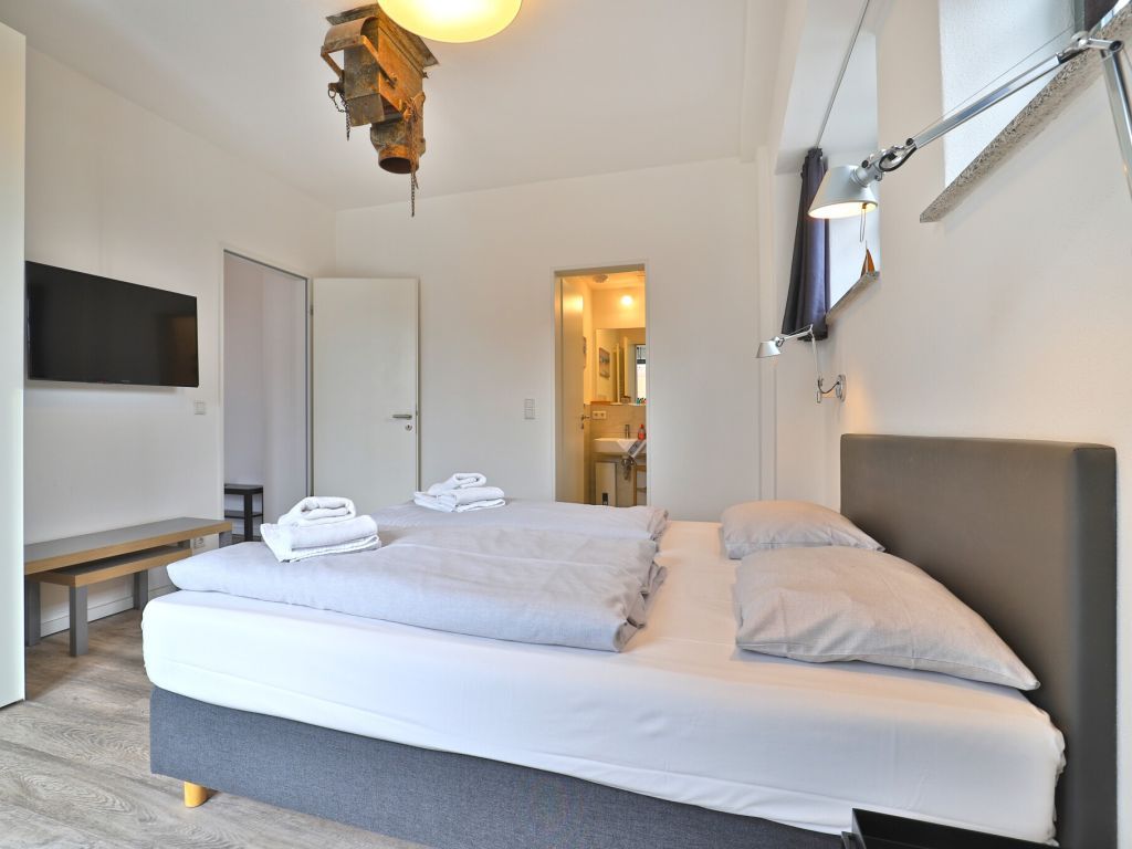 Ohlerich Speicher App. 08 - Blick in das Schlafzimmer mit 2. TV