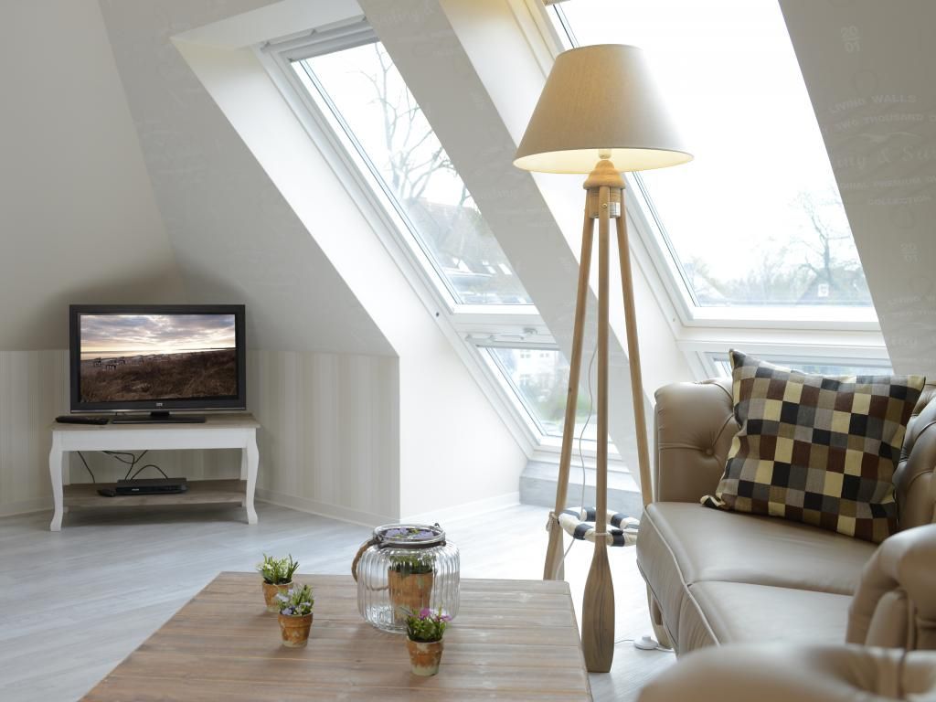 Muschel Whg. Schildkröte - Blick in den Wohnbereich mit Fernseher