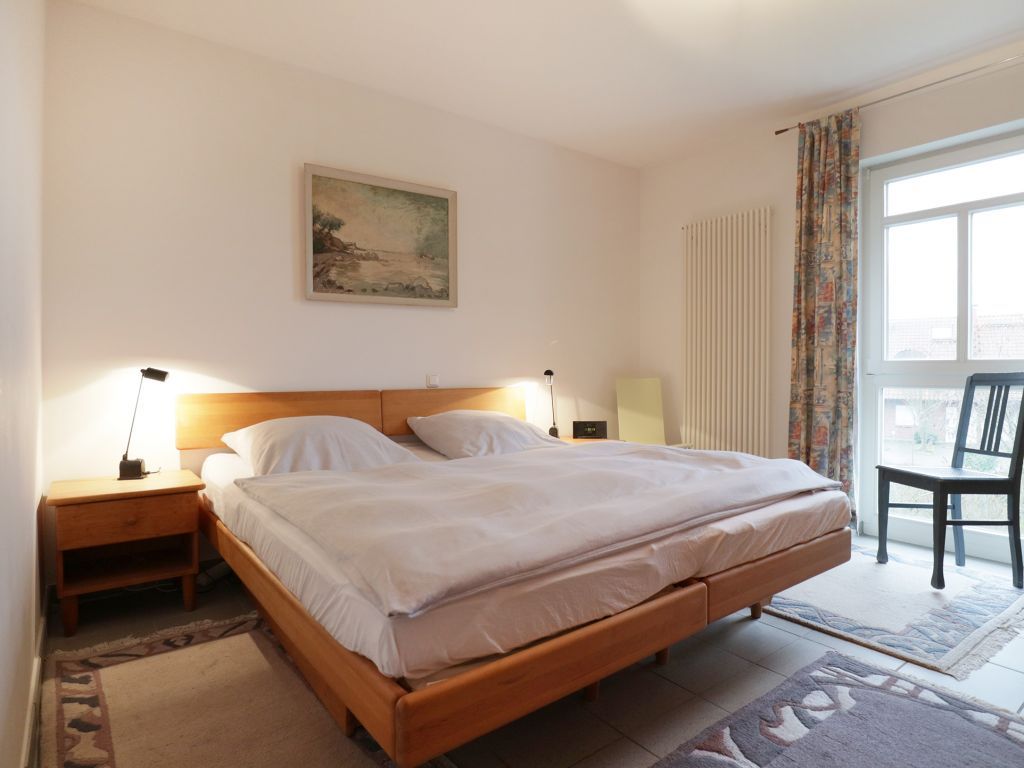 Haus am Teich D18- komfortables Doppelbett im Schlafbereich