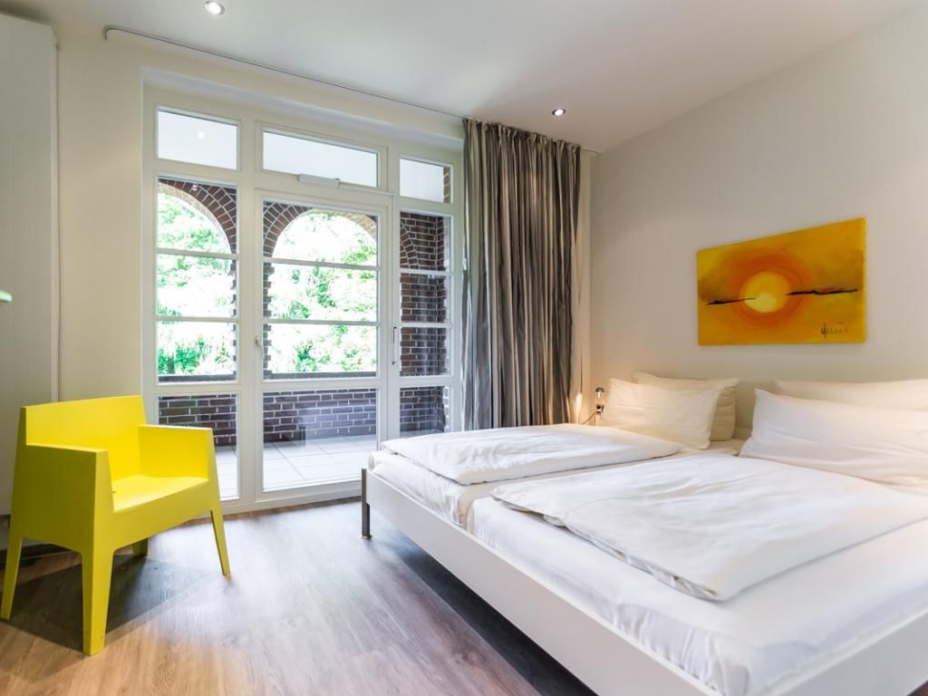 Villa Höger Whg.6 - Blick in das Schlafzimmer mit Zugang auf die Loggia