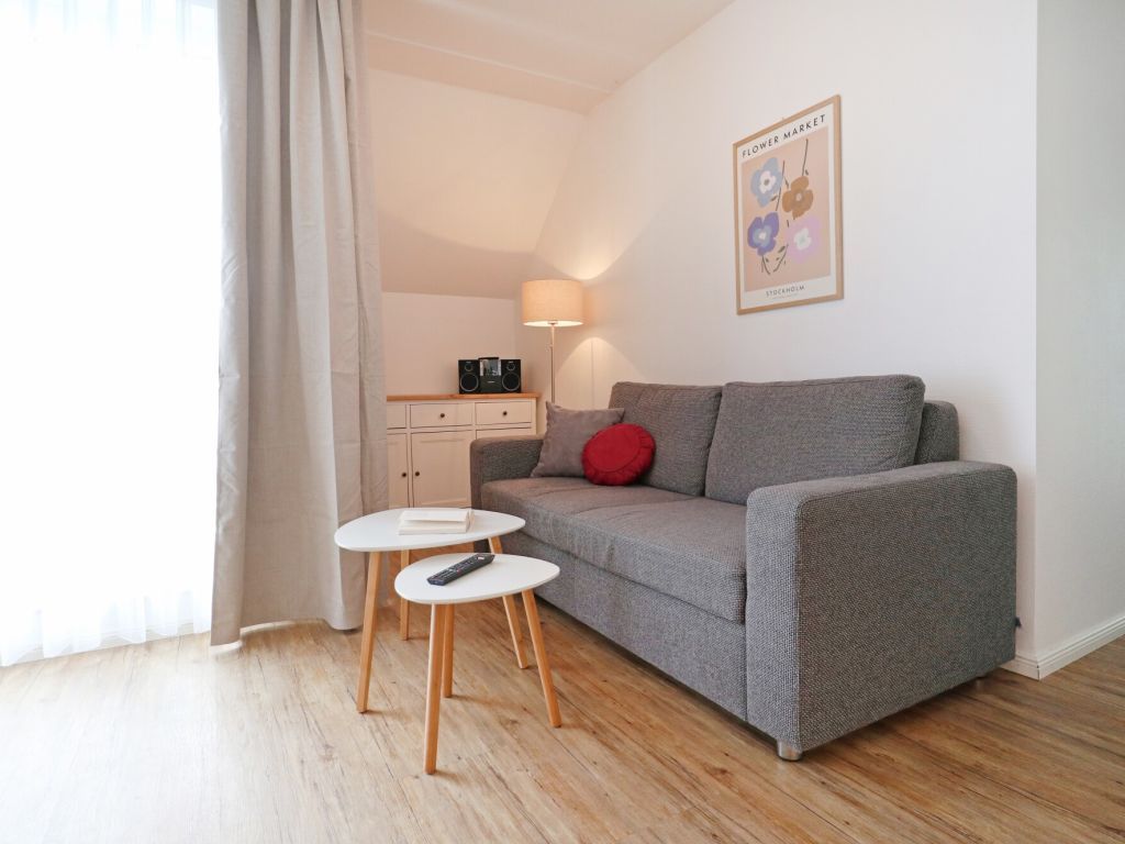 Haffblick Whg. Ha32 - Blick auf den Wohnbereich mit Schlafsofa