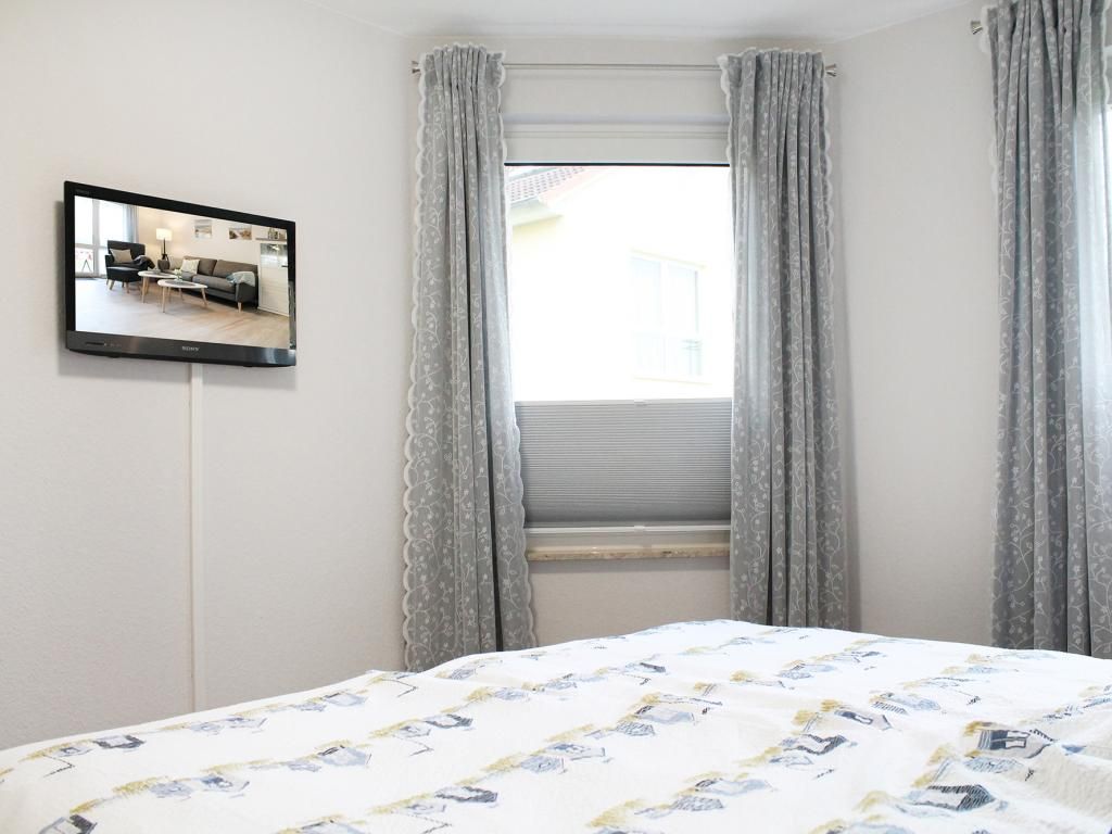 Godewind Whg. GW01 - Blick in das Schlafzimmer mit 2.TV