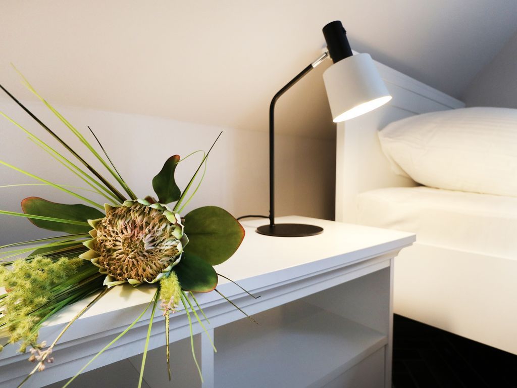 Jolle - Blick in ein Schlafzimmer mit zwei Einzelbetten im OG