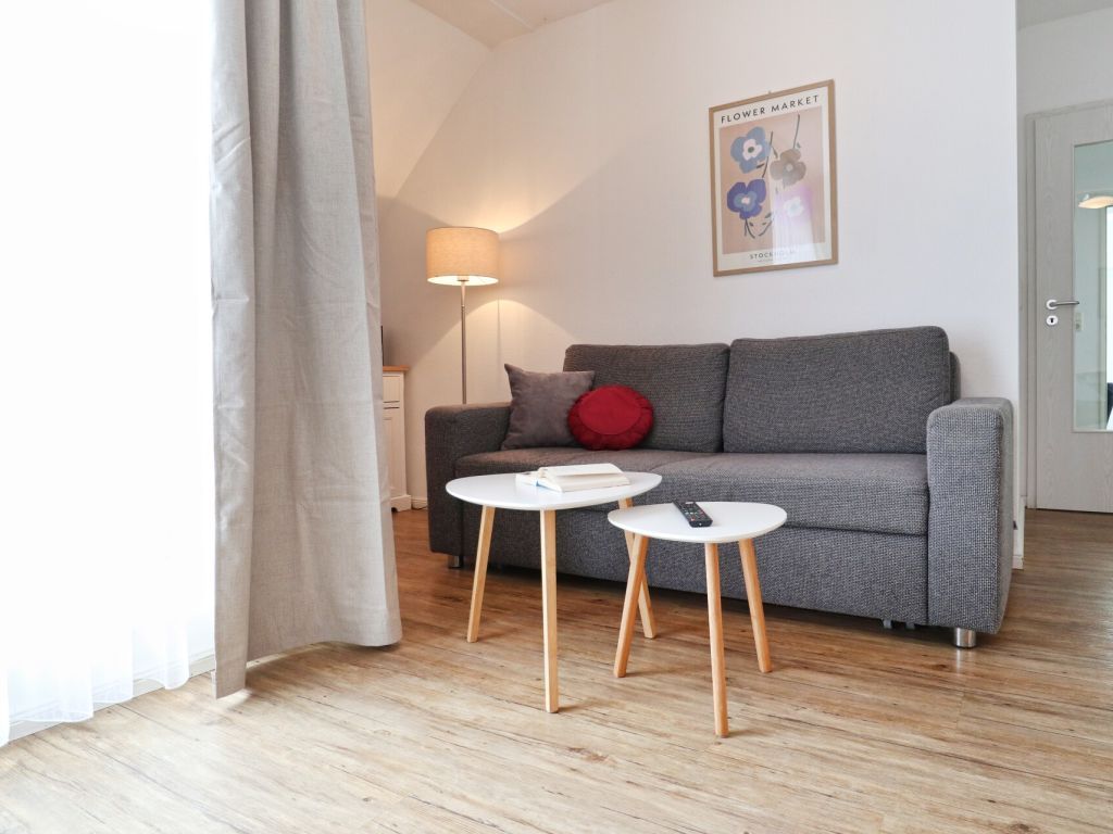 Haffblick Whg. Ha32 - Blick auf den Wohnbereich mit Schlafsofa