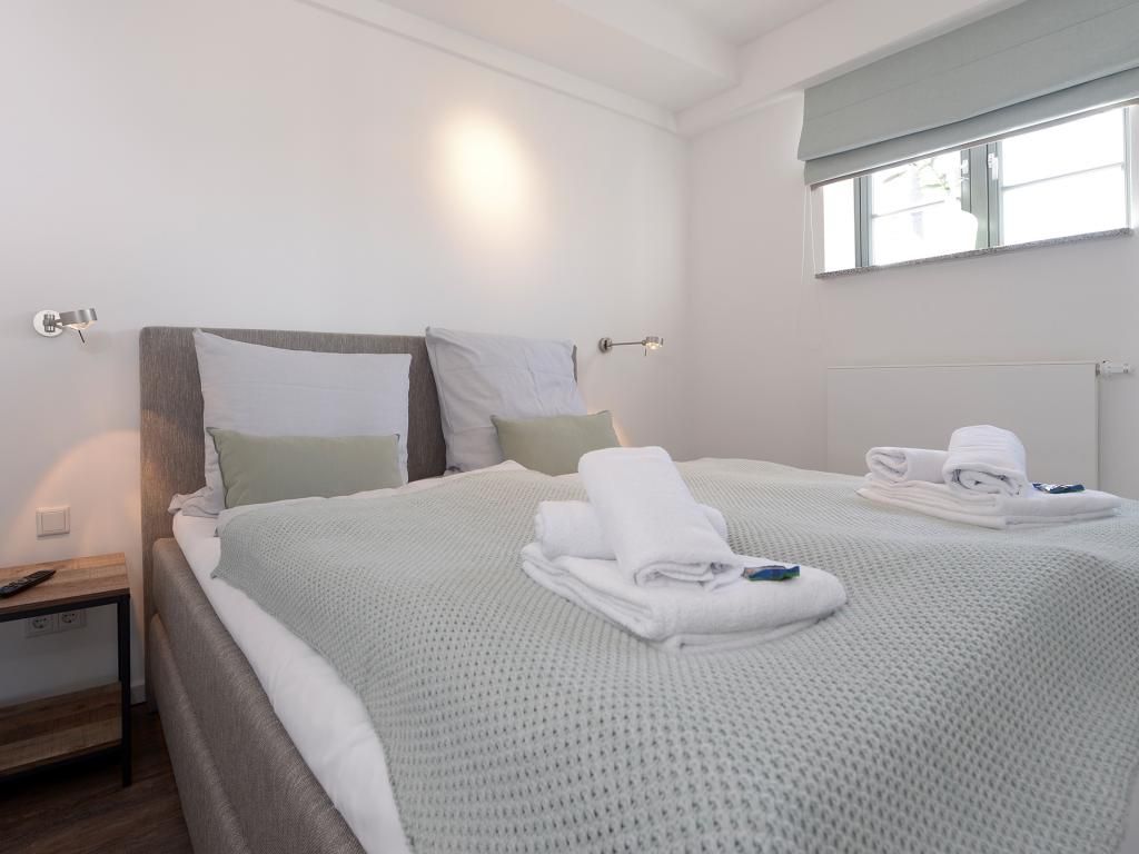 Ohlerich Speicher App. 19 - Blick in das kleine Schlafzimmer mit TV