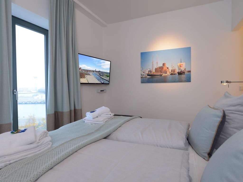 Ohlerich Speicher App. 19 - Blick in das Schlafzimmer mit 2. TV
