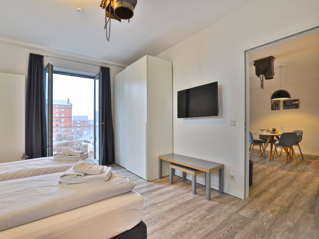 Ohlerich Speicher App. 08 - Blick in das Schlafzimmer mit 2. TV
