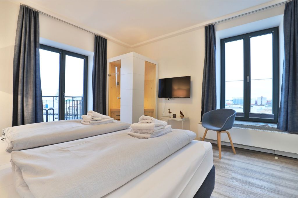 Ohlerich Speicher App. 28 - Blick in das Schlafzimmer mit Infrarotsauna