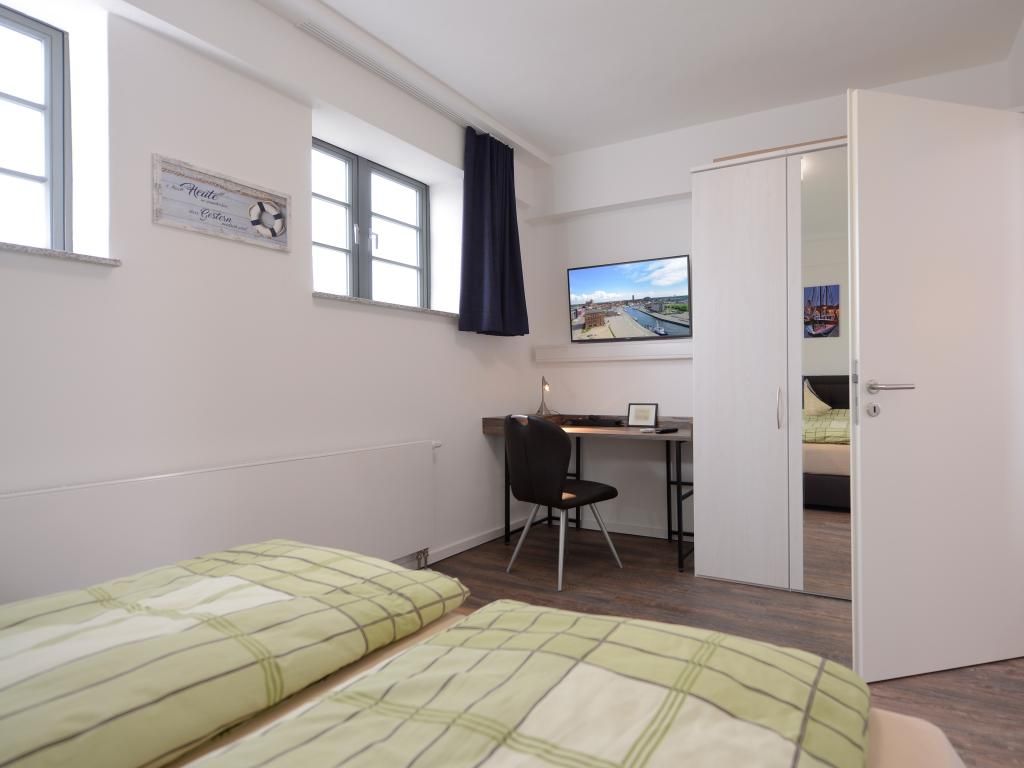 Ohlerich Speicher App. 24 - Blick in das großzügige Schlafzimmer mit 2.TV