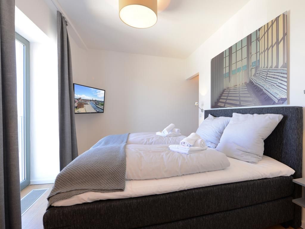 Ohlerich Speicher App. 34 - Blick in das Schlafzimmer mit 2. TV