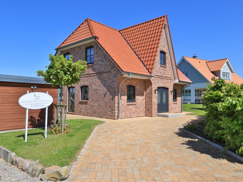 Jolle Ferienhaus - Blick auf das wunderschöne Ferienhaus und die Einfahrt