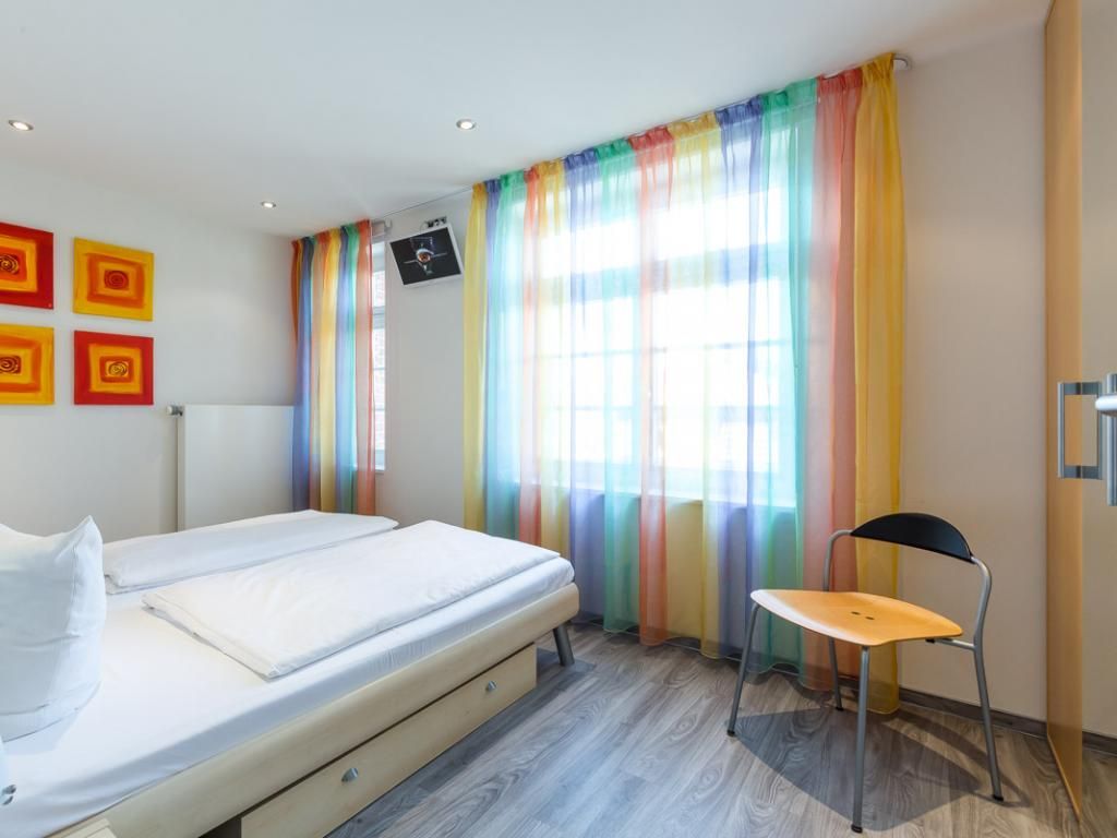 Villa Höger Whg.11 - Blick in das Schlafzimmer mit einem Doppelbett