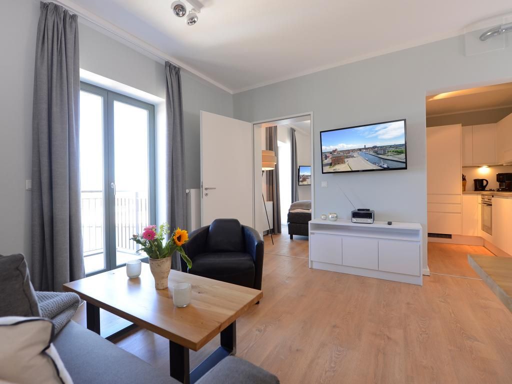 Ohlerich Speicher App. 34 - Blick vom Sofa auf den TV und die Küche