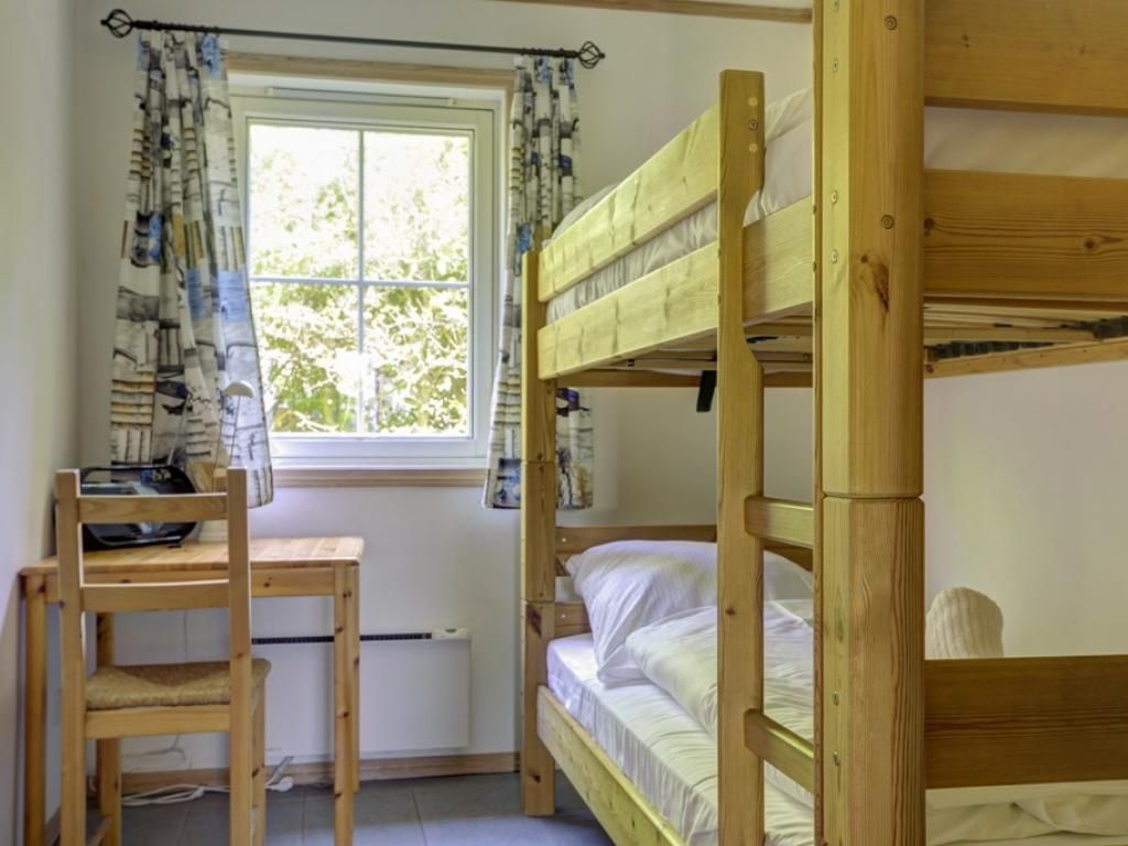 Haus Seepferdchen Whg. 2- Blick in das Schlafzimmer mit Etagenbett
