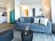Hafenspitze App.28- gemütliches Sofa im Wohnbereich